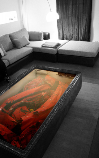 Illustration for article titled If You Crash a Ferrari, You Can Always Turn it Into a Crashed Ferrari Coffee Table